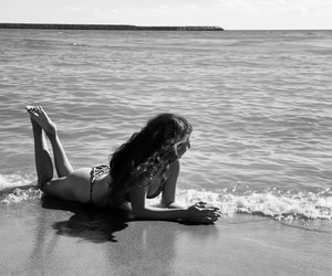 Black-and-white portrait at the edge of the Black Sea