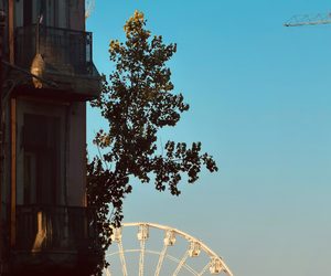 Historic architecture and Ferris wheel in Constanța