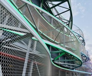 Wide view of illuminated flowing steel architecture in Bucharest