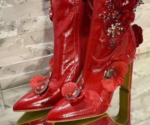 Crimson Secret Garden Couture Boots — Pointed toes and sculptural golden heels beneath an asymmetric garden of embellishments.