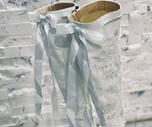 Étoile Blanche Crystal Lace Couture Boots — Oversized white satin bows and long flowing ribbons finish the back.