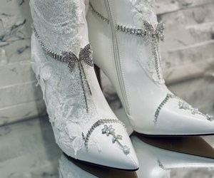 Étoile Blanche Crystal Lace Couture Boots — A close-up of the jeweled ankle bows and the crystal necklace laid over the toe.